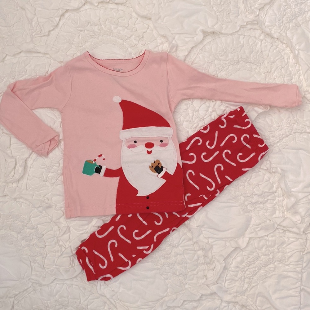 Santa having hot chocolate and Candy cane pajamas